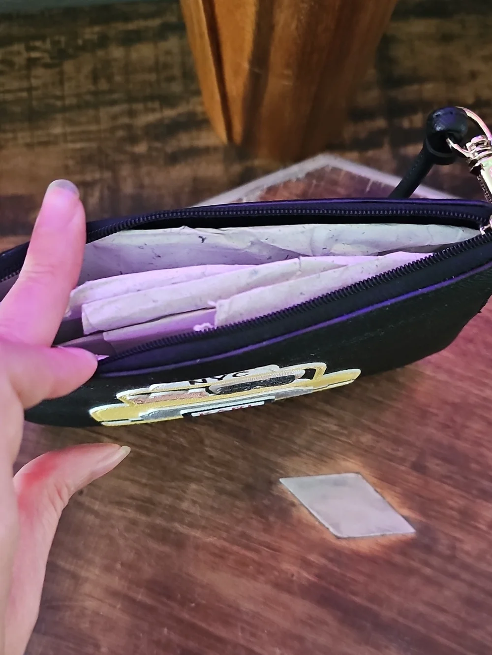 NWOT Karl Lagerfeld Black Wristlet with Yellow Taxi Appliqué